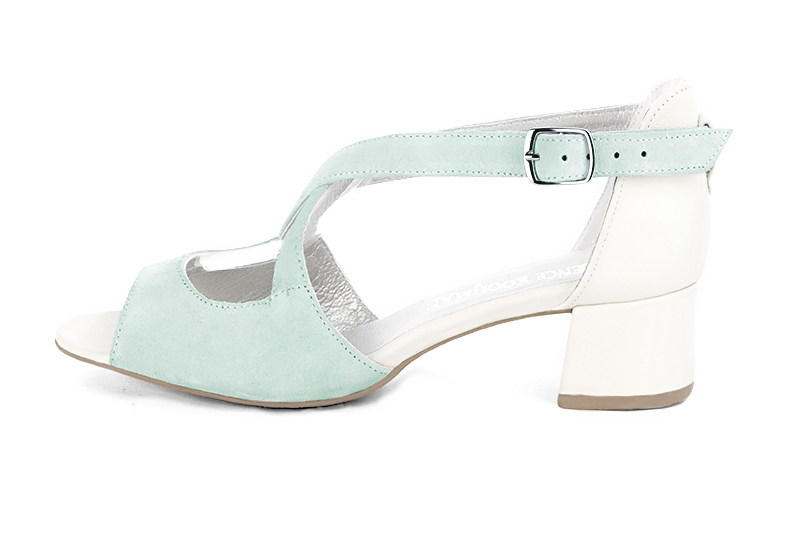 Aquamarine blue and off white women's closed back sandals, with crossed straps. Round toe. Low flare heels. Profile view - Florence KOOIJMAN